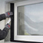 Bande d'étanchéité prépliée pour raccords de fenêtres, autocollante sur toute sa surface, destinée à une utilisation en extérieur.